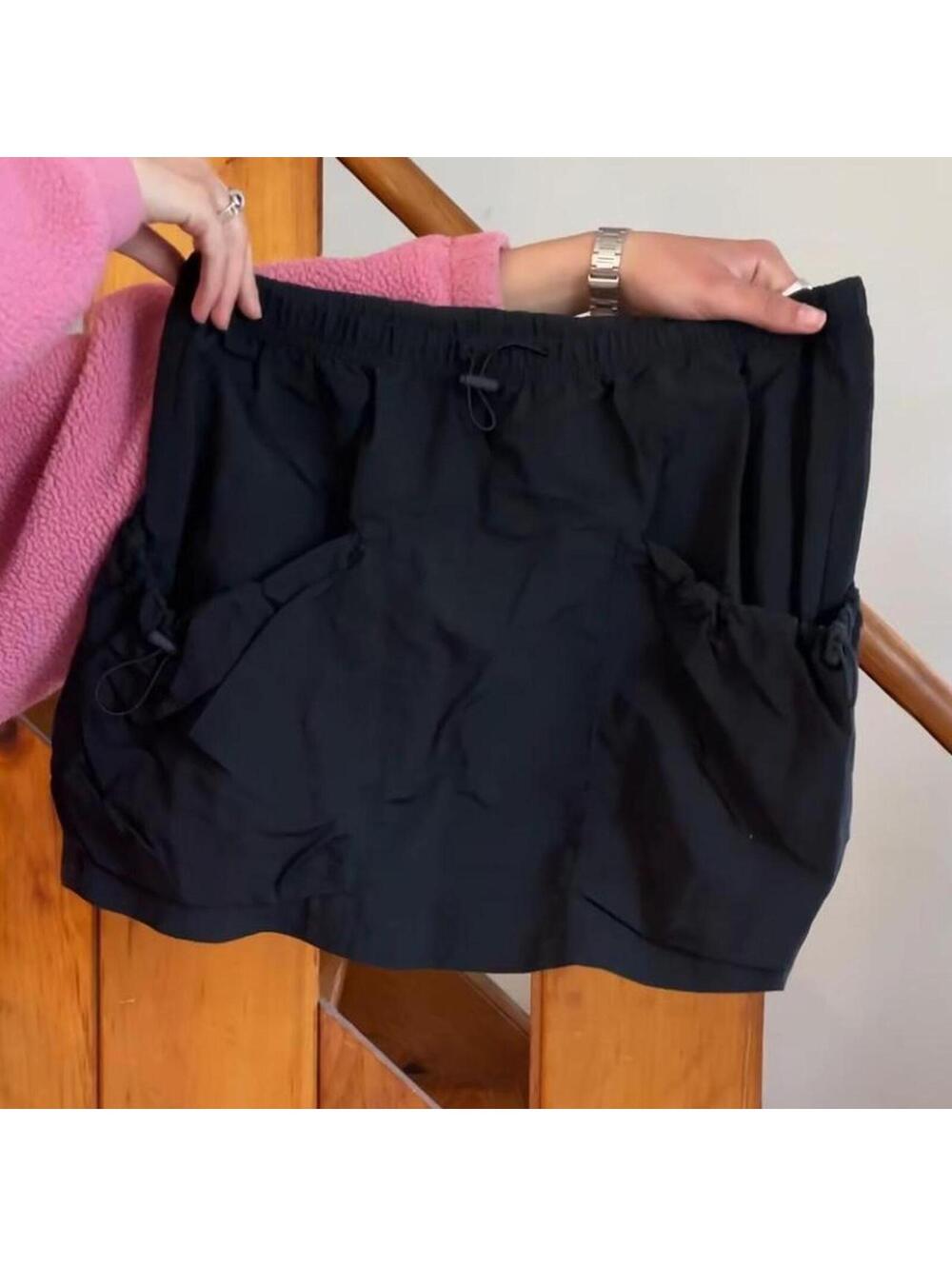 aritzia tna black activewear cargo skirt with pockets Size M